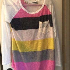 Spring colors in a tunic top with lace pocket